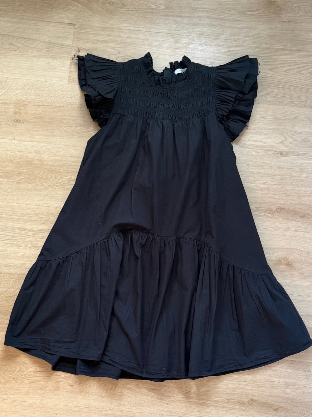 Smocked Ruffle-Sleeve Mini Dress in Black